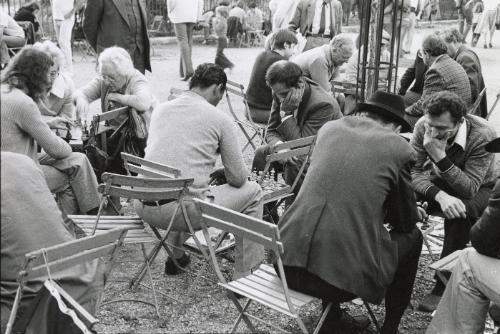 Crowd playing chess in park, Paris