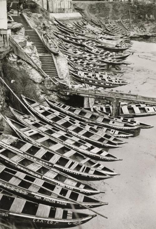 Boats docked on shore, Ghana