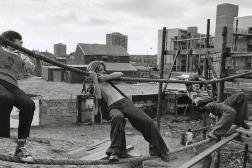 A construction site becomes a playground for these teenagers playing truant from school, Manchester, England,