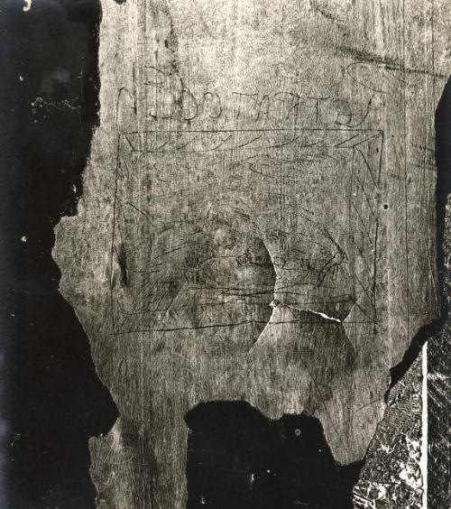 Still life with engraving on wood