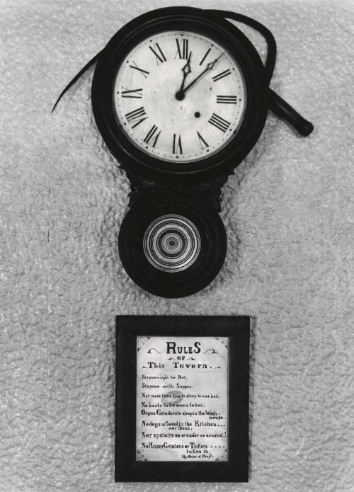 Clock and sign in tavern, Smuggler’s Notch, Utah