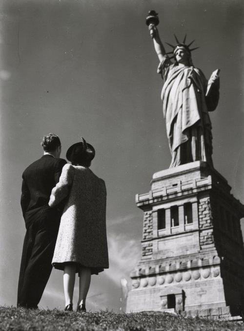 Couple at the Foot of Statue of Liberty, New York