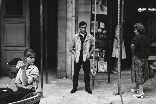 Street scene with man and two women, Paris, France