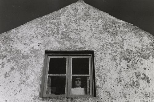 Woman at window, Portugal