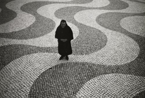 Woman and azulejos, Padrão dos Descobrimentos, Lisbon, Portugal
