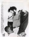 Yippie leader Jerry Rubin rips off his jurist's robe in front of a University of Utah crowd in Salt Lake City, Utah as part of his defiance of the nation's legal system.