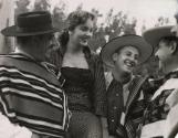 Gauchos with young lady during the annual festival of the Chilean "Guasos" (Gauchos), "Medialuna", in Rocangua, Chile
