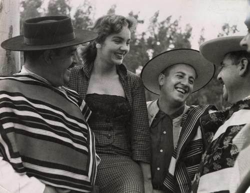 Gauchos with young lady during the annual festival of the Chilean "Guasos" (Gauchos), "Medialuna", in Rocangua, Chile