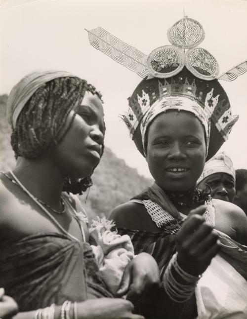 Zulu women show their jewelry to European visitors, South Africa