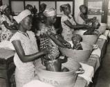 Mothers bathing their babies at a baby care course at the Red Cross, Leopoldville, the Belgian Congo (now Kinshasa, Democratic Republic of the Congo)