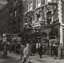 Arrival of the President of the Republic of France Albert Lebrun in London: A Whitheall Street with a sign on a bar reading "Welcome M. Lebrun", London