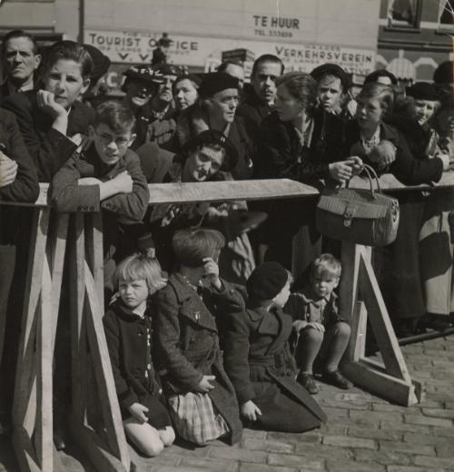 Christening of the Heiress to Holland's Throne (Beatrix Armgard): The loyal subjects of the Royal House of Orange, aristocrats and commoners, rich and poor, old and young, whole-heartedly took part in the joyful celebrations on the occasion of the christening of Princess Beatrix, infant daughter of Princess Juliana and Prince Bernard. With touching affection and devotion, the whole county rejoiced in the happiness of its beloved Royal family. A brilliant pageant was staged to honor the heiress presumptive to the Dutch throne. All the notables and dignitaries of the country, Royal guests from abroad, including King Leopold of the Belgians joined the splendid procession to the great church of the Hague where the religious ceremony took place. The infant princess' godparents were King Leopold of the Belgians, Duke Adolph Frederick of Mecklen