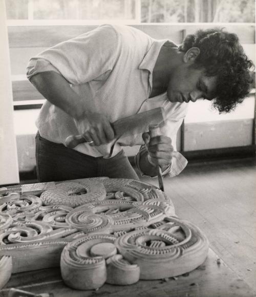 Māori master craftsmen making wood carvings, New Zealand