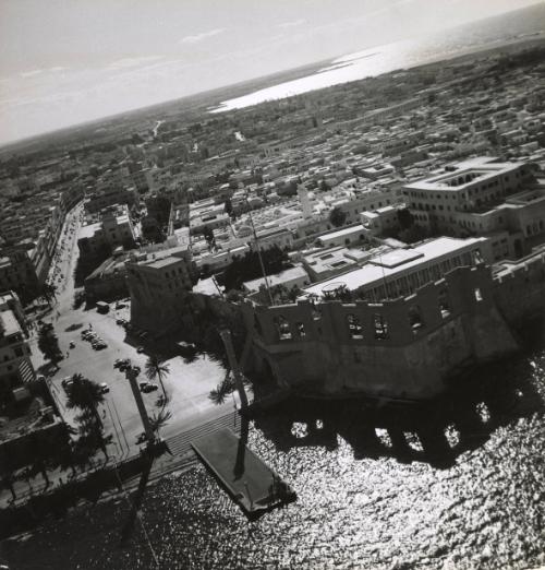 Aerial view of Tripoli, showing the Castle on the right at the water's edge, Libya.