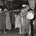 Arabian Nights in Morocco: With fabulous splendor and a dazzling display of Oriental pageantry Marrakesh (French Morocco) celebrated the simultaneous marriage of the three sons of its Pasha. / View of some of the musicians during the wedding feast. Tirelessly they played Moroccan folk tunes.