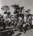 The dancers of the Catholic procession always wear headresses while doing the sacred dance, Carnival, Brazil