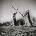 Untitled (Two Arab men fighting with sticks), Northern Africa